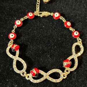 Gold and Red Infinity Charm Bracelet